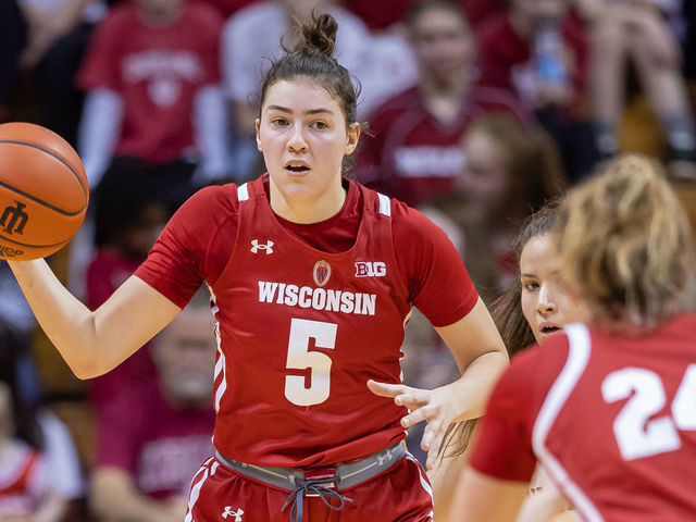 BLOOMINGTON, IN - JANUARY 15: Julie Pospisilova #5 of the Wisconsin Badgers brings the ball up court during the game against the Indiana Hoosiers at Simon Skjodt Assembly Hall on January 15, 2023 in Bloomington, Indiana.