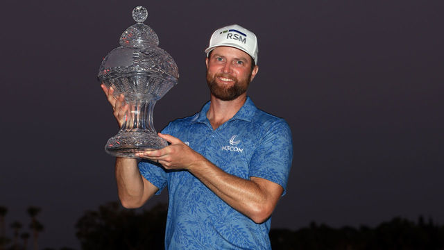 PALM BEACH GARDENS, FLORIDA - FEBRUARY 26: Chris Kirk of the United States stands with the trophy after winning The Honda Classic at PGA National Resort And Spa on February 26, 2023 in Palm Beach Gardens, Florida.