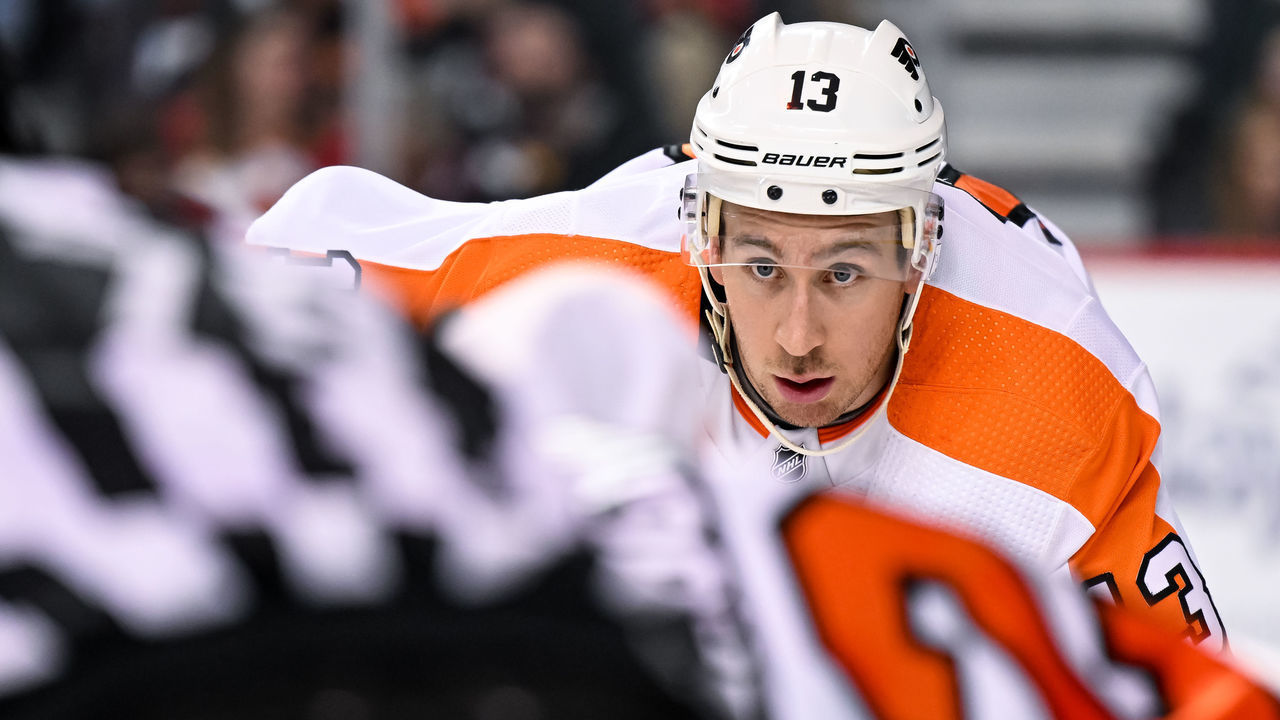 CALGARY, AB - FEBRUARY 20: Philadelphia Flyers Winger Kevin Hayes (13) gets set for a face-off during the third period of an NHL game between the Calgary Flames and the Philadelphia Flyers on February 20, 2023, at the Scotiabank Saddledome in Calgary, AB.