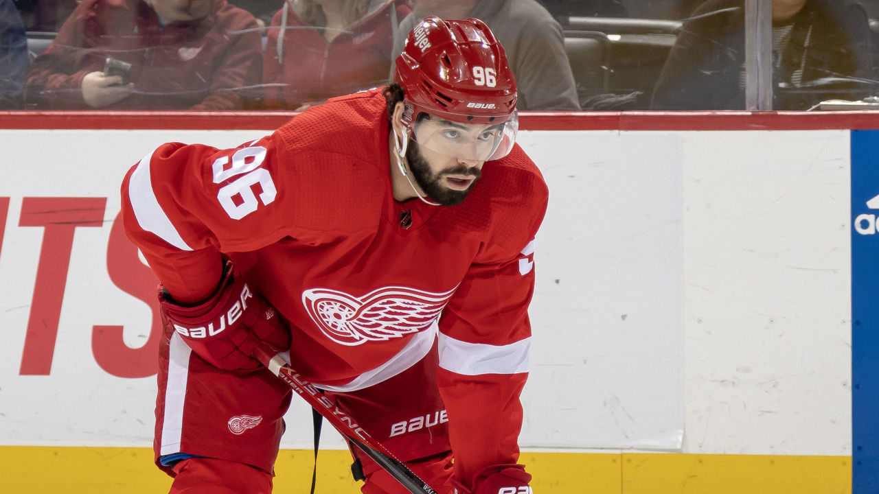 DETROIT, MI - FEBRUARY 23: Jake Walman #96 of the Detroit Red Wings gets set for the face-off against the New York Rangers during the first period of an NHL game at Little Caesars Arena on February 23, 2023 in Detroit, Michigan. Detroit defeated New York 4-1.