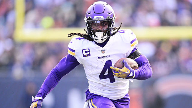 CHICAGO, ILLINOIS - JANUARY 08: Running back Dalvin Cook #4 of the Minnesota Vikings carries the ball during the game against the Chicago Bears at Soldier Field on January 08, 2023 in Chicago, Illinois.