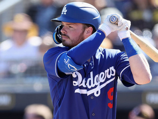 Gavin Lux the Los Angeles Dodgers looks on during the game against