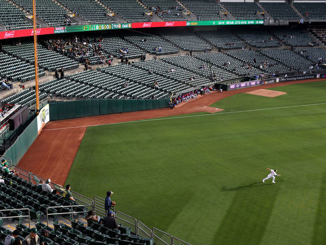 OAKLAND, CALIFORNIA - MAY 26: Rows of seats sit empty as the Oakland Athletics play the Texas Rangers at RingCentral Coliseum on May 26, 2022 in Oakland, California. Attendance at Oakland Athletics baseball games have dwindled to historic lows as the team has traded away fan favorite players and continues to explore moving the team to Las Vegas if they can't reach a deal to build a new stadium near the Port of Oakland. The Athletics have the lowest attendance of all 30 Major League Baseball (MLB) as well as the league's lowest single game attendance for a May 2nd game that only drew 2,488 fans.