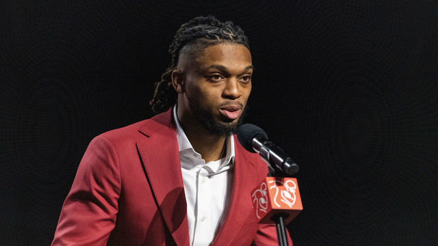 08 February 2023, USA, Phoenix: Super Bowl LVII, Damar Hamlin Award. NFL pro Damar Hamlin expresses his gratitude after receiving the Alan Page Community Award. The Buffalo Bills pro had collapsed on the field in January with cardiac arrest. Photo: Maximilian Haupt/dpa