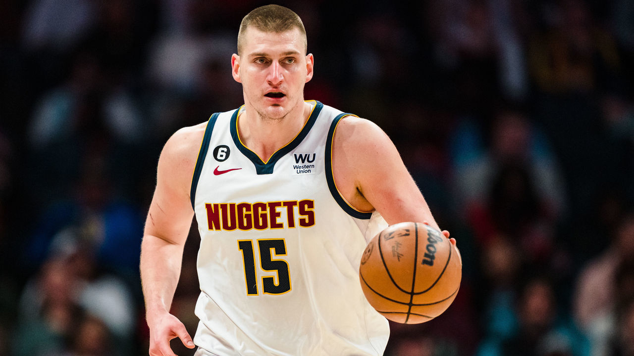 CHARLOTTE, NORTH CAROLINA - FEBRUARY 11: Nikola Jokic #15 of the Denver Nuggets brings the ball up court in the third quarter during their game against the Charlotte Hornets at Spectrum Center on February 11, 2023 in Charlotte, North Carolina.