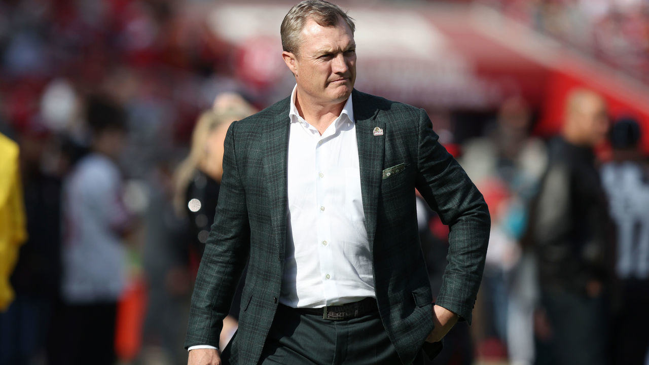 SANTA CLARA, CALIFORNIA - DECEMBER 24: San Francisco 49ers general manager, John Lynch, looks on before the game against the Washington Commanders at Levi's Stadium on December 24, 2022 in Santa Clara, California.