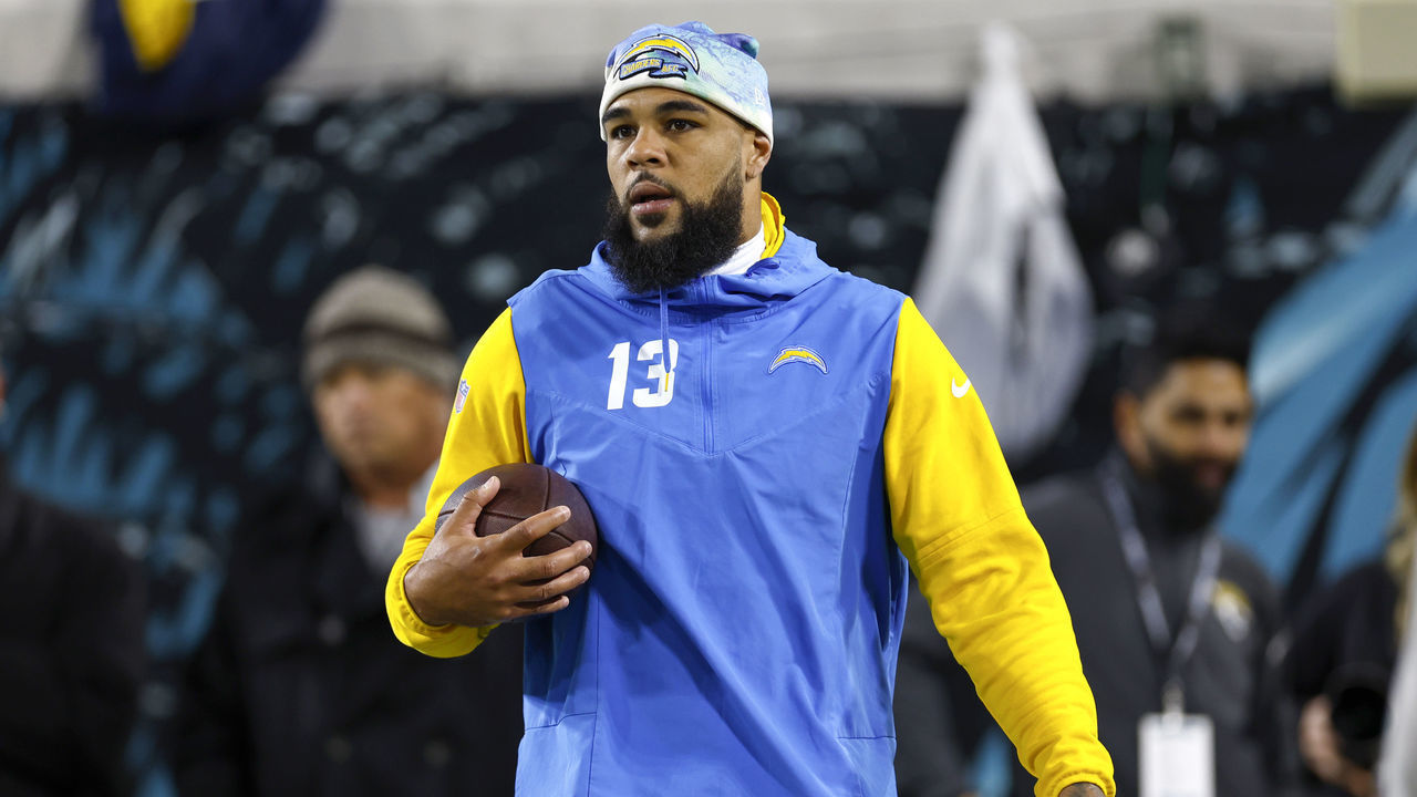 JACKSONVILLE, FLORIDA - JANUARY 14: Keenan Allen #13 of the Los Angeles Chargers warms up prior to a game against the Jacksonville Jaguars in the AFC Wild Card playoff game at TIAA Bank Field on January 14, 2023 in Jacksonville, Florida.