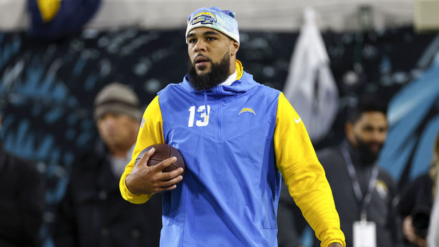 JACKSONVILLE, FLORIDA - JANUARY 14: Keenan Allen #13 of the Los Angeles Chargers warms up prior to a game against the Jacksonville Jaguars in the AFC Wild Card playoff game at TIAA Bank Field on January 14, 2023 in Jacksonville, Florida.