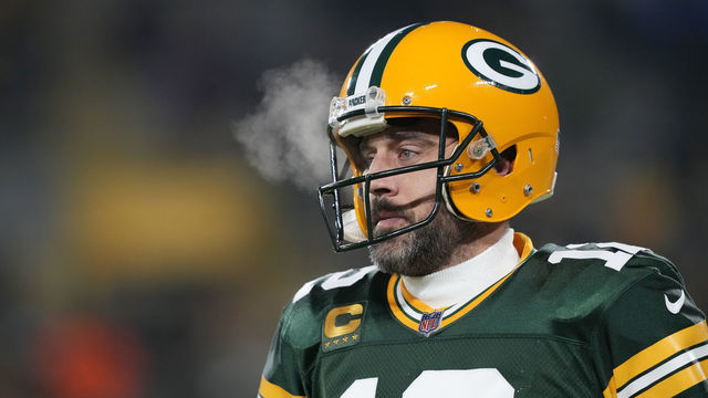GREEN BAY, WISCONSIN - JANUARY 08: Aaron Rodgers #12 of the Green Bay Packers warms up before a game against the Detroit Lions at Lambeau Field on January 08, 2023 in Green Bay, Wisconsin.