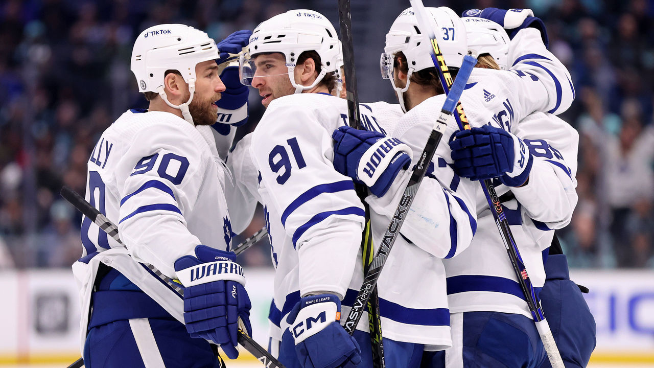 SEATTLE, WASHINGTON - FEBRUARY 26: Ryan O'Reilly #90 and John Tavares #91 of the Toronto Maple Leafs celebrate a goal by Mark Giordano #55 (not pictured) during the first period against the Seattle Kraken at Climate Pledge Arena on February 26, 2023 in Seattle, Washington.