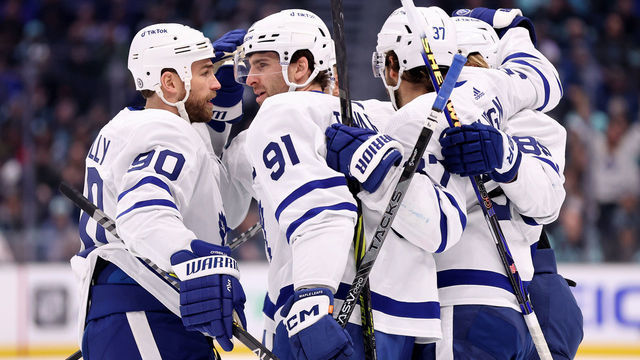 SEATTLE, WASHINGTON - FEBRUARY 26: Ryan O'Reilly #90 and John Tavares #91 of the Toronto Maple Leafs celebrate a goal by Mark Giordano #55 (not pictured) during the first period against the Seattle Kraken at Climate Pledge Arena on February 26, 2023 in Seattle, Washington.