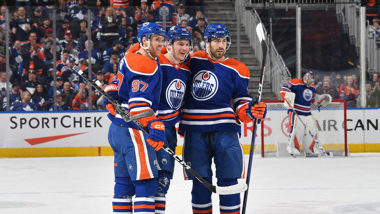 EDMONTON, CANADA - MARCH 1: Zach Hyman #18 of the Edmonton Oilers celebrates with Connor McDavid #97 and Evan Bouchard #2 after his first period goal against the Toronto Maple Leafs on March 1, 2023 at Rogers Place in Edmonton, Alberta, Canada.