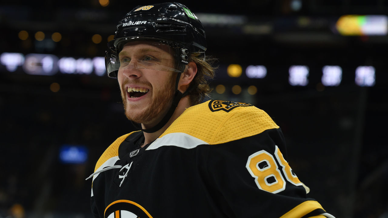 BOSTON, MA - APRIL 5: David Pastrnak #88 of the Boston Bruins smiles after a second period goal against the Philadelphia Flyers at the TD Garden on April 5, 2021 in Boston, Massachusetts.