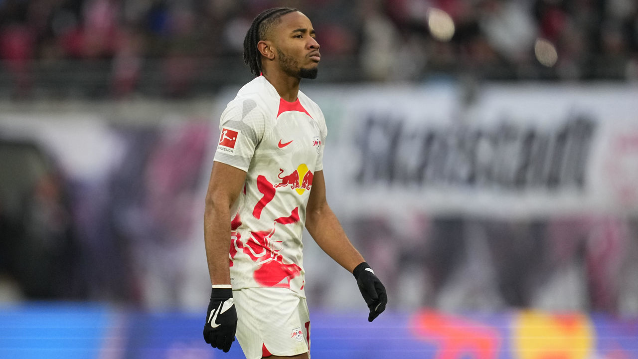 LEIPZIG, GERMANY - FEBRUARY 25: Christopher Nkunku of RB Leipzig looks on during the Bundesliga match between RB Leipzig and Eintracht Frankfurt at Red Bull Arena on February 25, 2023 in Leipzig, Germany.