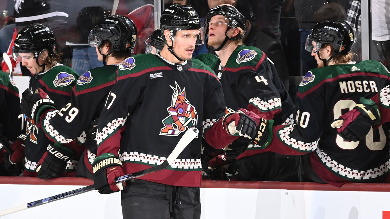 TEMPE, ARIZONA - JANUARY 17: Nick Bjugstad #17 of the Arizona Coyotes celebrates with teammates on the bench after scoring a goal against the Detroit Red Wings during the second period at Mullett Arena on January 17, 2023 in Tempe, Arizona.