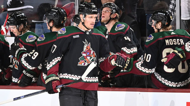 TEMPE, ARIZONA - JANUARY 17: Nick Bjugstad #17 of the Arizona Coyotes celebrates with teammates on the bench after scoring a goal against the Detroit Red Wings during the second period at Mullett Arena on January 17, 2023 in Tempe, Arizona.