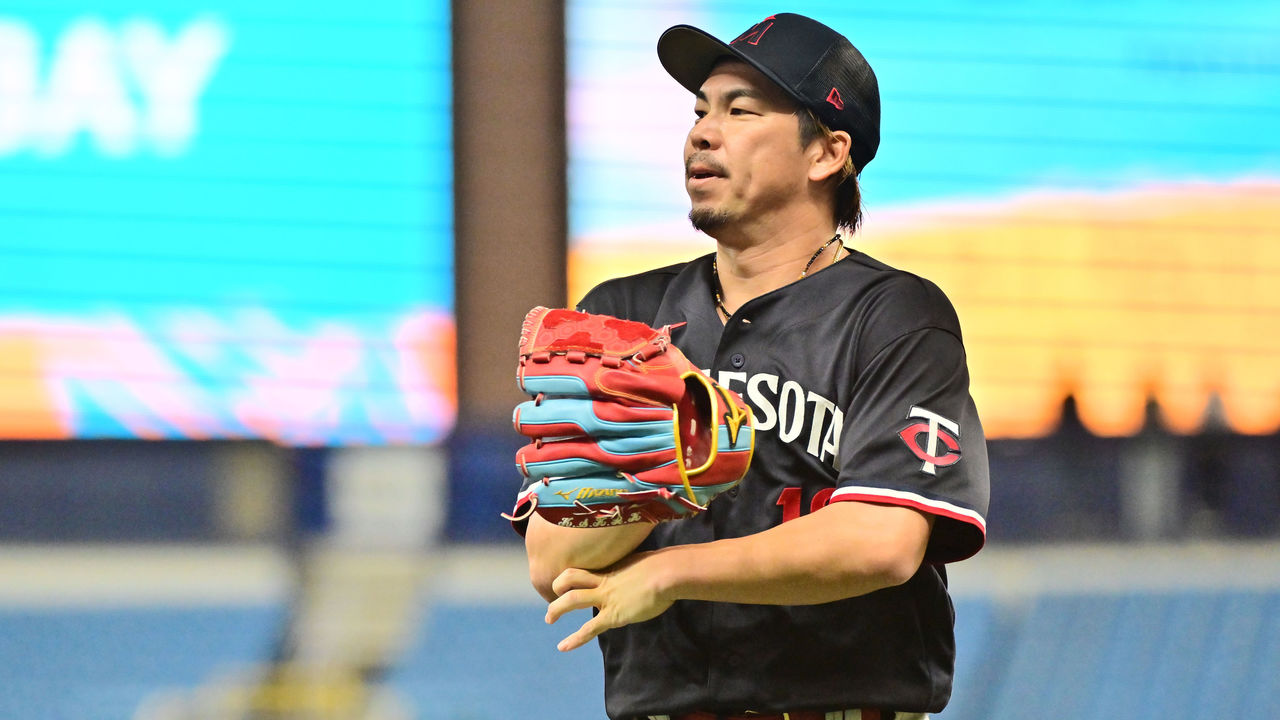 Kenta Maeda of the Minnesota Twins rests in the dugout before the News  Photo - Getty Images