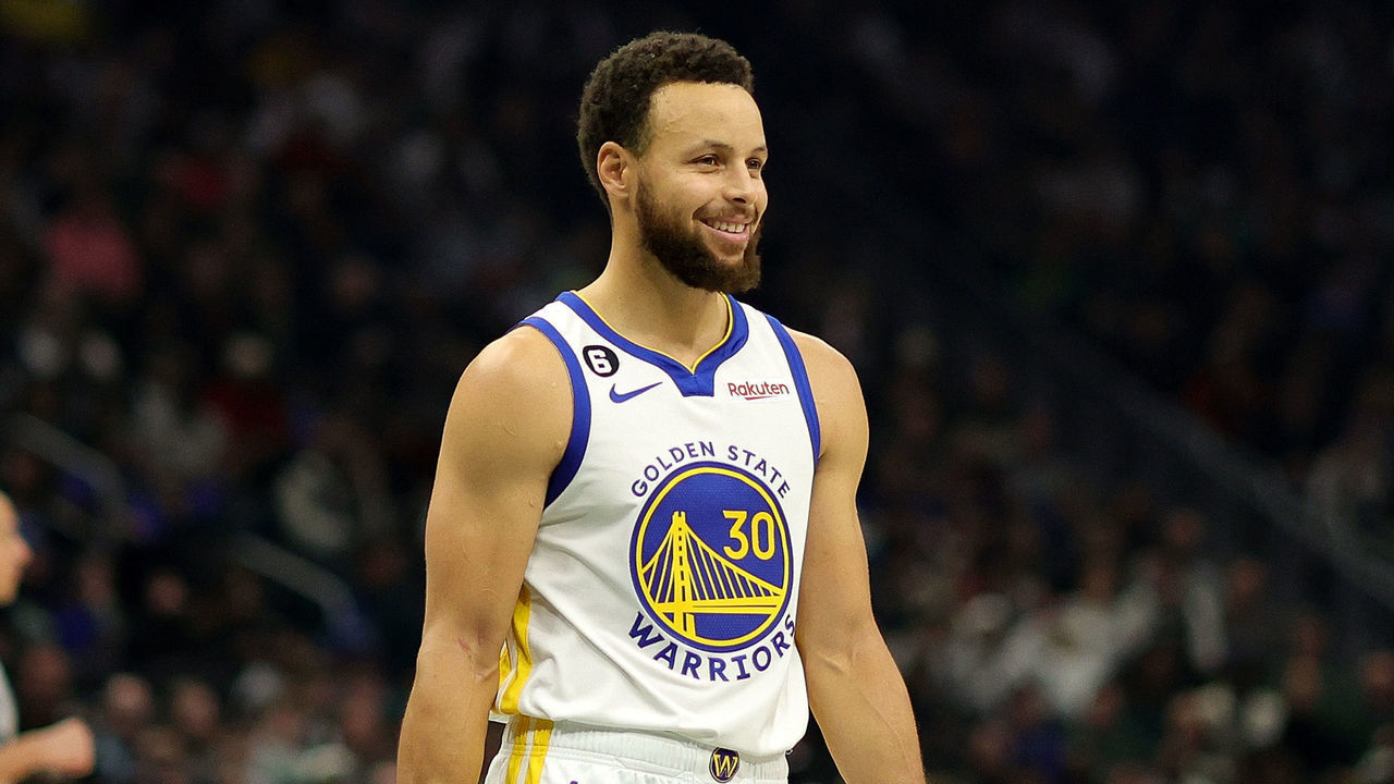 MILWAUKEE, WISCONSIN - DECEMBER 13: Stephen Curry #30 of the Golden State Warriors walks backcourt during a game against the Milwaukee Bucks at Fiserv Forum on December 13, 2022 in Milwaukee, Wisconsin. The Bucks defeated the Warriors 128-111.