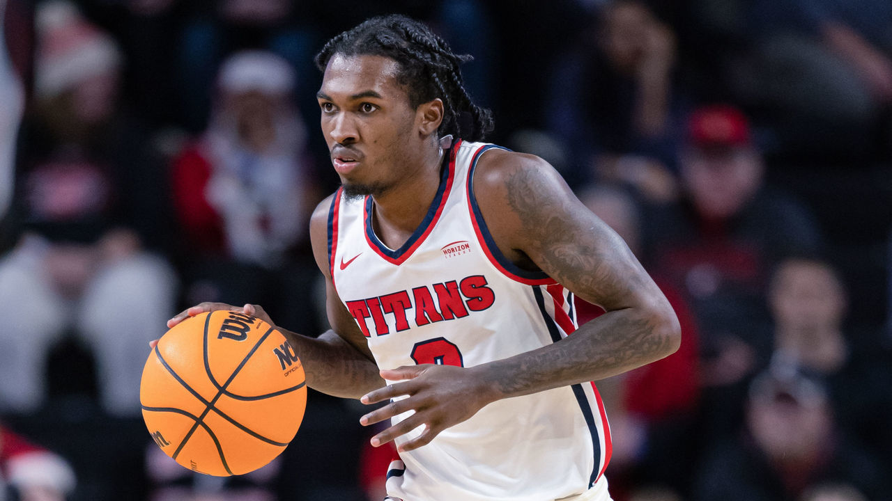 CINCINNATI, OH - DECEMBER 21: Antoine Davis #0 of the Detroit Mercy Titans brings the ball up court during the game against the Cincinnati Bearcats at Fifth Third Arena on December 21, 2022 in Cincinnati, Ohio.