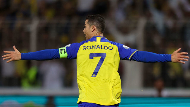 Nassr's Portuguese forward Cristiano Ronaldo celebrates scoring his team's fourth goal the Saudi Pro League football match between Al-Wehda and Al-Nassr at the King Abdulaziz Stadium in Mecca on February 9, 2023.