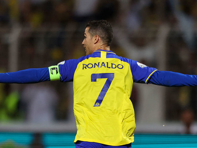 Nassr's Portuguese forward Cristiano Ronaldo celebrates scoring his team's fourth goal the Saudi Pro League football match between Al-Wehda and Al-Nassr at the King Abdulaziz Stadium in Mecca on February 9, 2023.