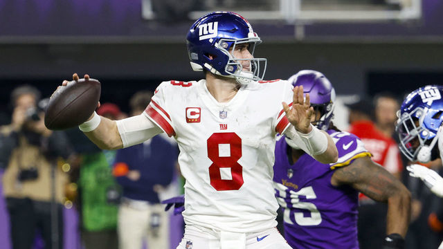 MINNEAPOLIS, MINNESOTA - JANUARY 15: Daniel Jones #8 of the New York Giants throws a pass against the Minnesota Vikings during the second half in the NFC Wild Card playoff game at U.S. Bank Stadium on January 15, 2023 in Minneapolis, Minnesota.