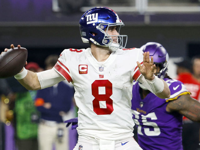 MINNEAPOLIS, MINNESOTA - JANUARY 15: Daniel Jones #8 of the New York Giants throws a pass against the Minnesota Vikings during the second half in the NFC Wild Card playoff game at U.S. Bank Stadium on January 15, 2023 in Minneapolis, Minnesota.
