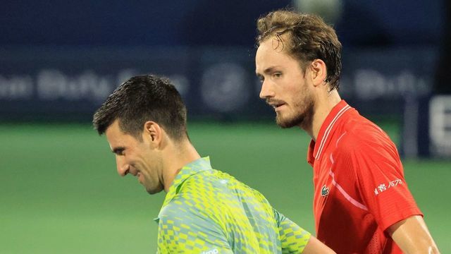 Serbia's Novak Djokovic (L) congratulates Russia's Daniil Medvedev after their ATP Dubai Duty Free Tennis Championship semi-final match in Dubai, on March 3, 2023.