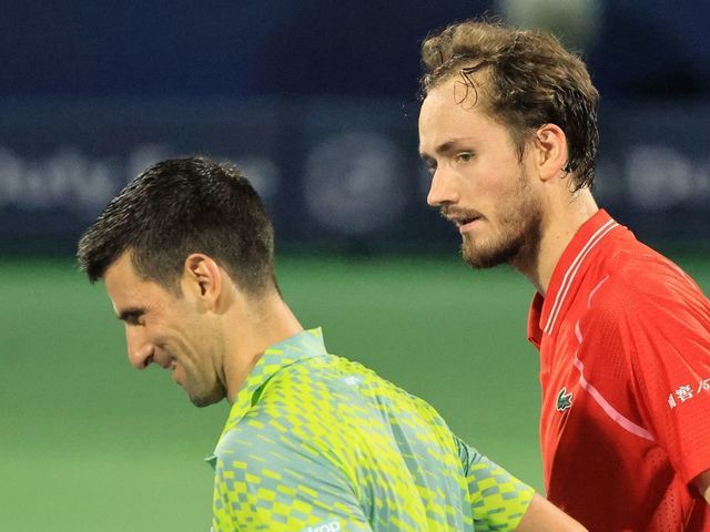 Serbia's Novak Djokovic (L) congratulates Russia's Daniil Medvedev after their ATP Dubai Duty Free Tennis Championship semi-final match in Dubai, on March 3, 2023.