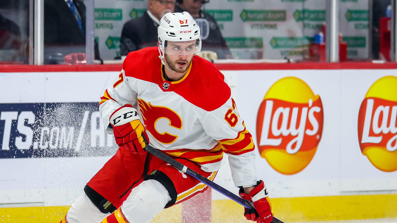 WINNIPEG, CANADA - JANUARY 03: Radim Zohorna #67 of the Calgary Flames skates during first period action against the Winnipeg Jets at Canada Life Centre on January 03, 2023 in Winnipeg, Manitoba, Canada.