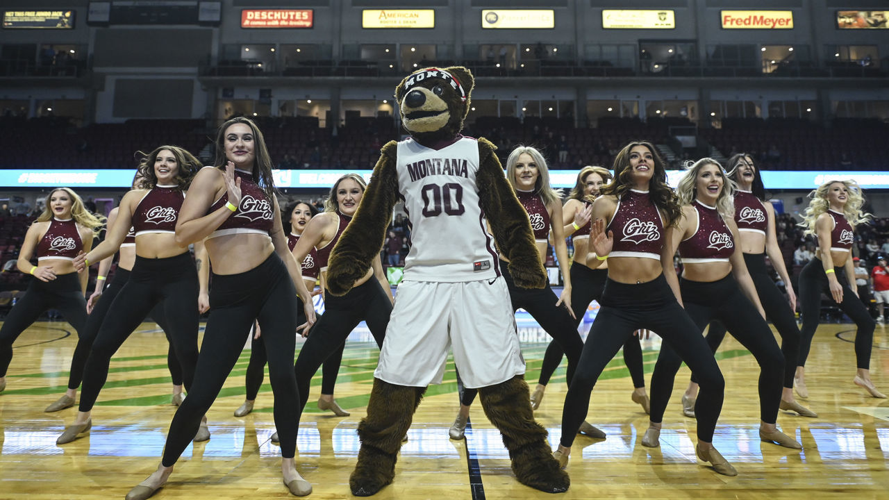 MISSOULA, MT - MARCH 10: Montana Grizzlies mascot Monte and the dance team performn against the Weber State Wildcats in the quarterfinals of the Men's Big Sky Conference Basketball Championships at Idaho Central Arena on March 10, 2022 in Boise, Idaho. Montana lost to Weber State 69-56.