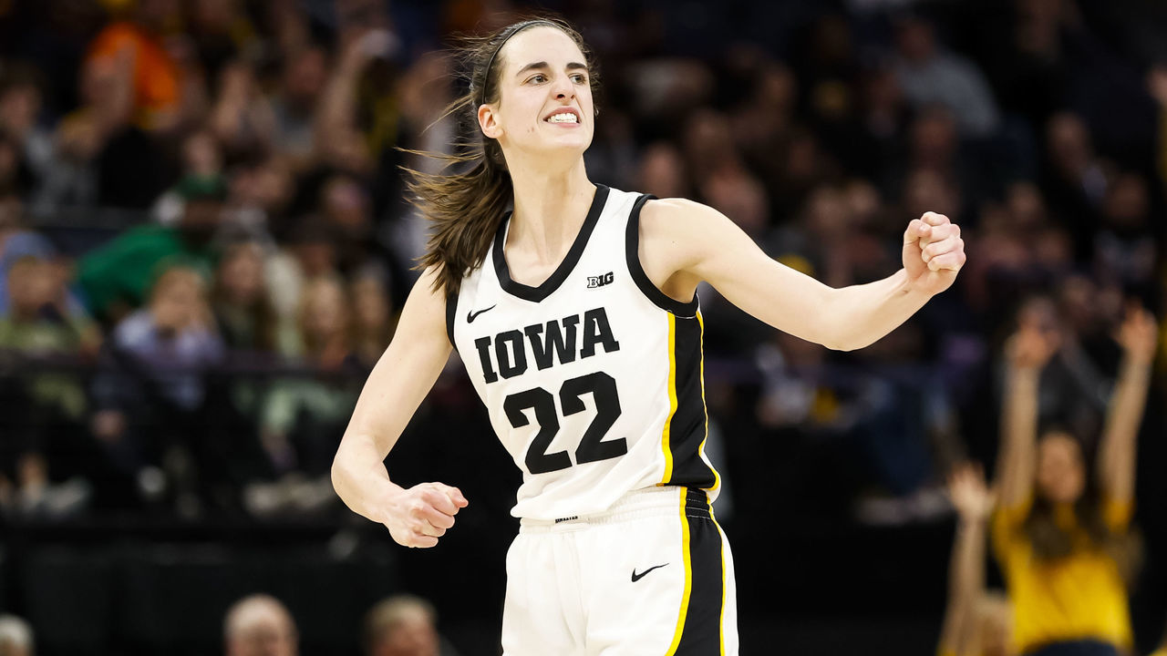 MINNEAPOLIS, MN - MARCH 03: Caitlin Clark #22 of the Iowa Hawkeyes celebrates her three-point basket against the Purdue Boilermakers in the second half of the game in the quarterfinals of the Big Ten Women's Basketball Tournament at Target Center on March 3, 2023 in Minneapolis, Minnesota. The Hawkeyes defeated the Boilermakers 69-57.