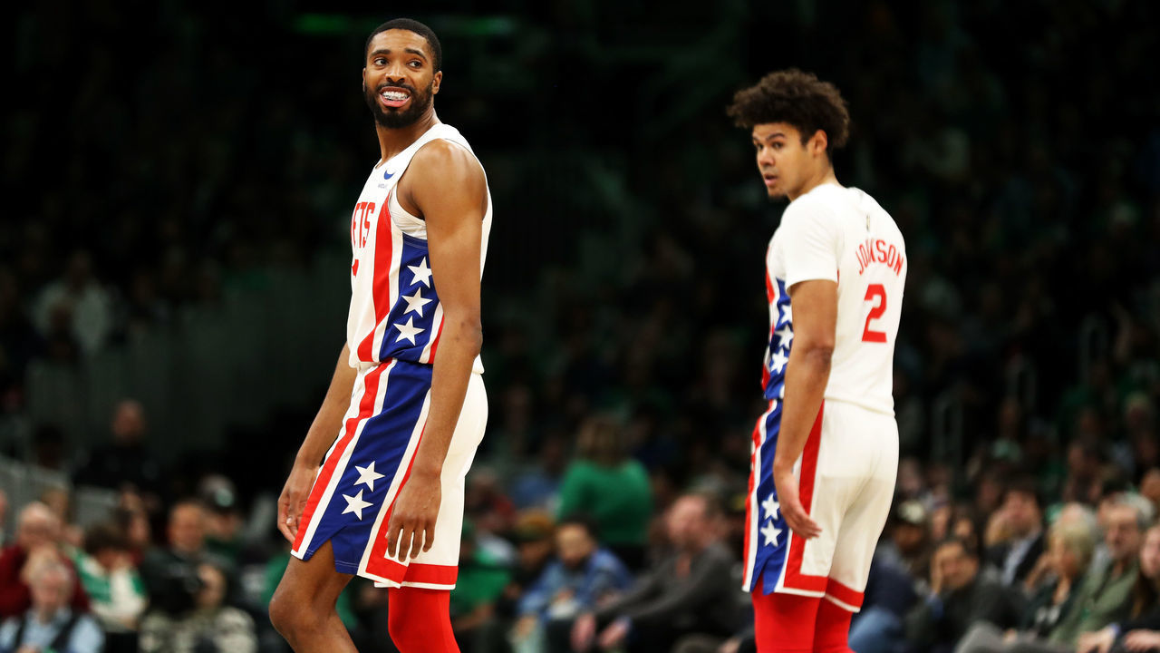 BOSTON, MASSACHUSETTS - MARCH 03: Mikal Bridges #1 of the Brooklyn Nets and Cameron Johnson #2 of the Brooklyn Nets look on during the fourth quarter of the game against the Boston Celtics at TD Garden on March 03, 2023 in Boston, Massachusetts.