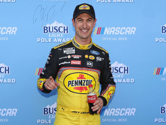 LAS VEGAS, NEVADA - MARCH 04: Joey Logano, driver of the #22 Pennzoil Ford, poses for photos after winning the pole award during practice for the NASCAR Cup Series Pennzoil 400 at Las Vegas Motor Speedway on March 04, 2023 in Las Vegas, Nevada.
