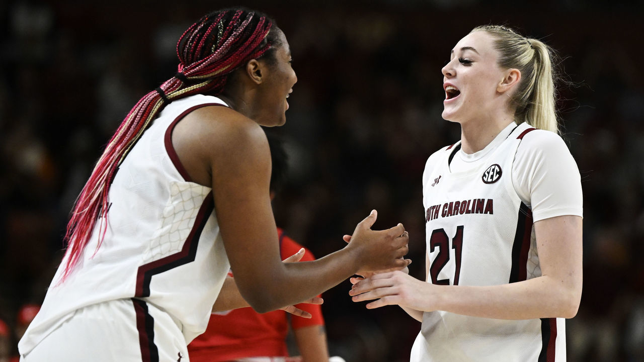 GREENVILLE, SOUTH CAROLINA - MARCH 04: Chloe Kitts #21 and Aliyah Boston #4 of the South Carolina Gamecocks celebrate their win over the Ole Miss Rebels during the semifinals of the SEC Women's Basketball Tournament at Bon Secours Wellness Arena on March 04, 2023 in Greenville, South Carolina.