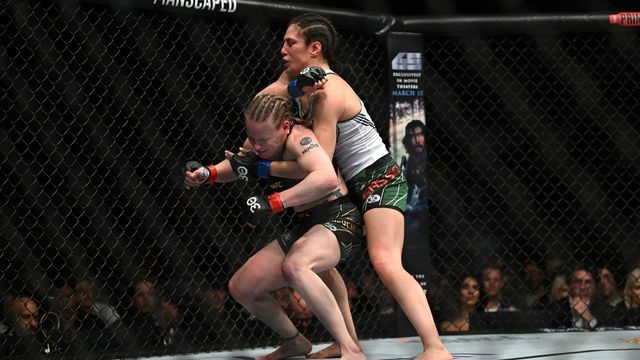 Mexico's mixed martial arts fighter Alexa Grasso (R) fights Kyrgyzstan's mixed martial arts fighter Valentina Shevchenko during their UFC 285 women's flyweight title bout at T-Mobile Arena, in Las Vegas, Nevada, on March 4, 2023.