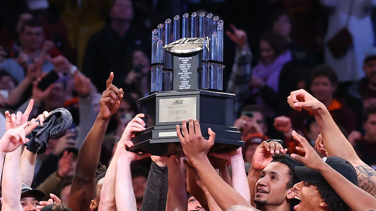 BROOKLYN, NY - MARCH 12: Virginia Tech Hokies hold up the championship trophy after winning the ACC Tournament final college basketball game between the Duke Blue Devils and the Virginia Tech Hokies on March 12, 2022, at the Barclays Center in Brooklyn, New York.
