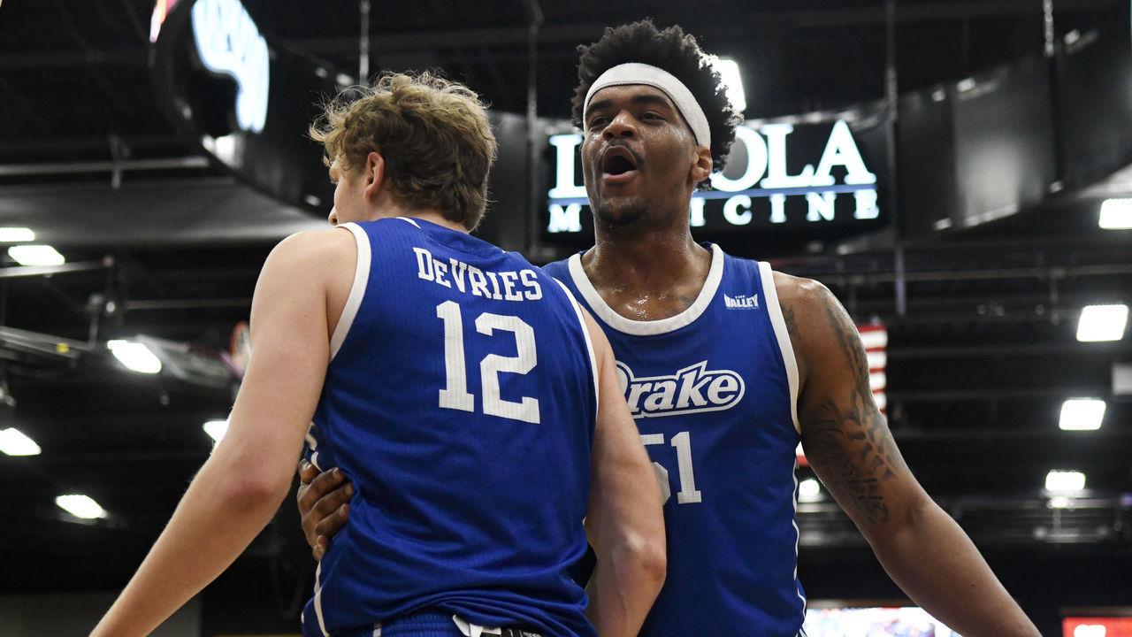 CHICAGO, IL - FEBRUARY 19: Drake Bulldogs guard Tucker Devries (12) and forward Darnell Brodie (51) celebrate a point during a college basketball game between the Drake Bulldogs and the Loyola Chicago Ramblers on February 19, 2022, at Joseph J. Gentile Arena in Chicago, IL.