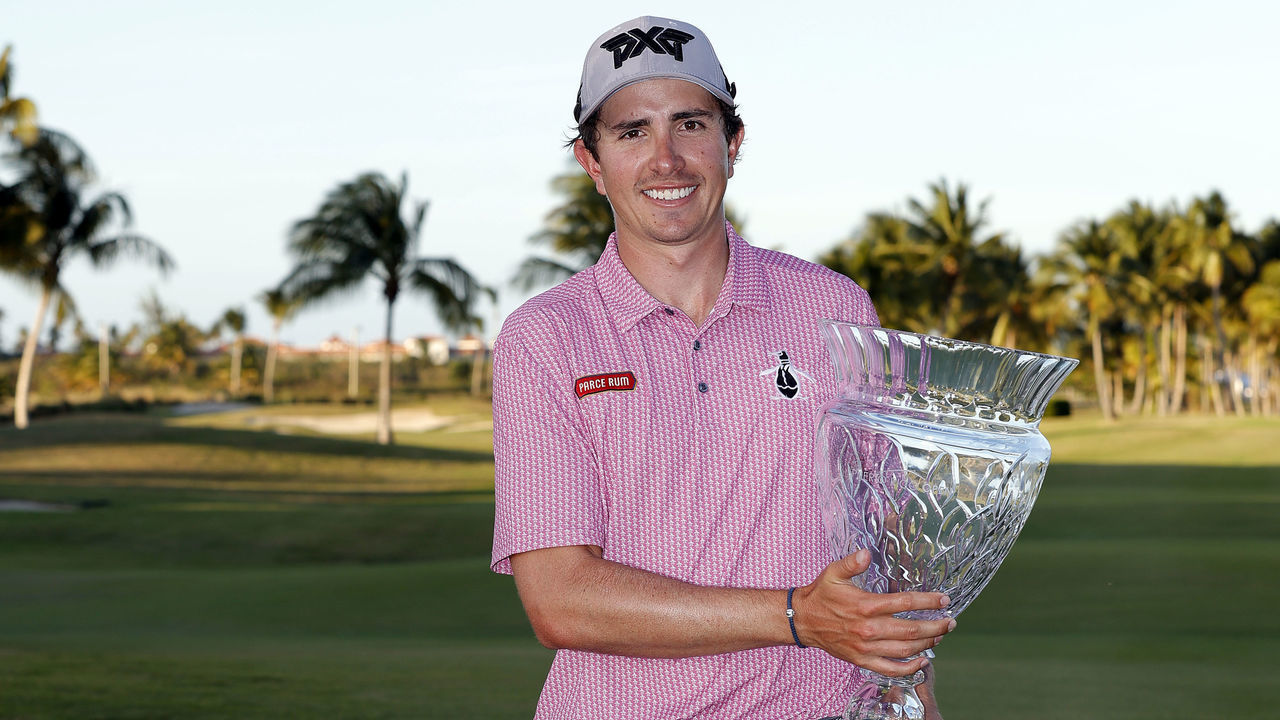 RIO GRANDE, PUERTO RICO - MARCH 05: Nico Echavarria of Columbia poses with the trophy on the 18th green after winning the Puerto Rico Open at Grand Reserve Golf Club on March 05, 2023 in Rio Grande, Puerto Rico.