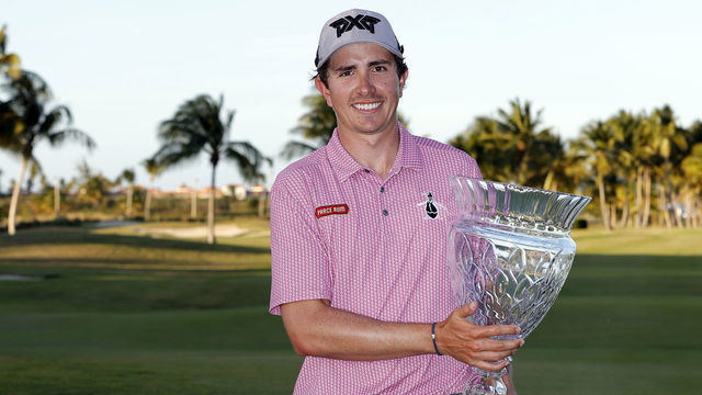 RIO GRANDE, PUERTO RICO - MARCH 05: Nico Echavarria of Columbia poses with the trophy on the 18th green after winning the Puerto Rico Open at Grand Reserve Golf Club on March 05, 2023 in Rio Grande, Puerto Rico.