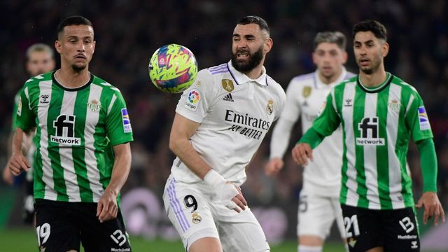 Real Madrid's French forward Karim Benzema (C) vies with Real Betis' Italian defender Luiz Felipe (L) during the Spanish League football match between Real Betis and Real Madrid CF at the Benito Villamarin stadium in Seville on March 5, 2023.