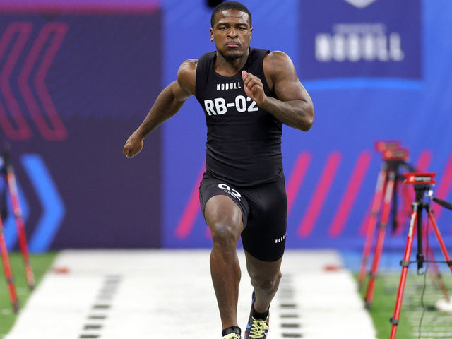 INDIANAPOLIS, INDIANA - MARCH 05: Devon Achane of Texas A&M participates in the 40-yard dash during the NFL Combine at Lucas Oil Stadium on March 05, 2023 in Indianapolis, Indiana.