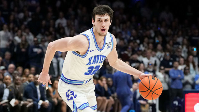 CINCINNATI, OHIO - JANUARY 21: Zach Freemantle #32 of the Xavier Musketeers dribbles the ball in the second half against the Georgetown Hoyas at the Cintas Center on January 21, 2023 in Cincinnati, Ohio.