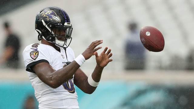JACKSONVILLE, FLORIDA - NOVEMBER 27: Lamar Jackson #8 of the Baltimore Ravens warms up prior to the game against the Jacksonville Jaguars at TIAA Bank Field on November 27, 2022 in Jacksonville, Florida.