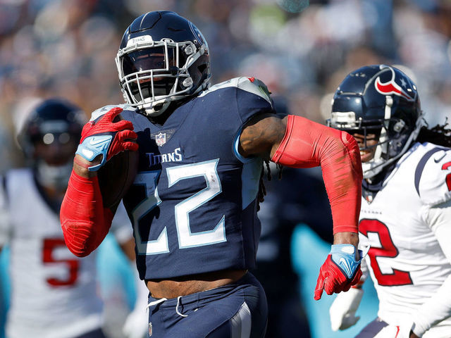 NASHVILLE, TENNESSEE - DECEMBER 24: Derrick Henry #22 of the Tennessee Titans runs for a touchdown during the first quarter gaht at Nissan Stadium on December 24, 2022 in Nashville, Tennessee.