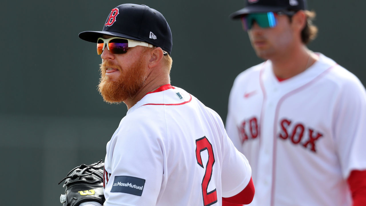 Fort Myers, FL - February 21: Boston Red Sox 1B Justin Turner, foreground, and Triston Casas participate in a fielding drill.