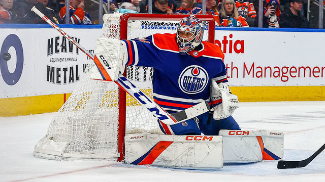 EDMONTON, AB - FEBRUARY 27: Edmonton Oilers Goalie Stuart Skinner (74) makes a big save in action in the second period of the Edmonton Oilers game versus the Boston Bruins on February 27, 2023 at Rogers Place in Edmonton, AB.