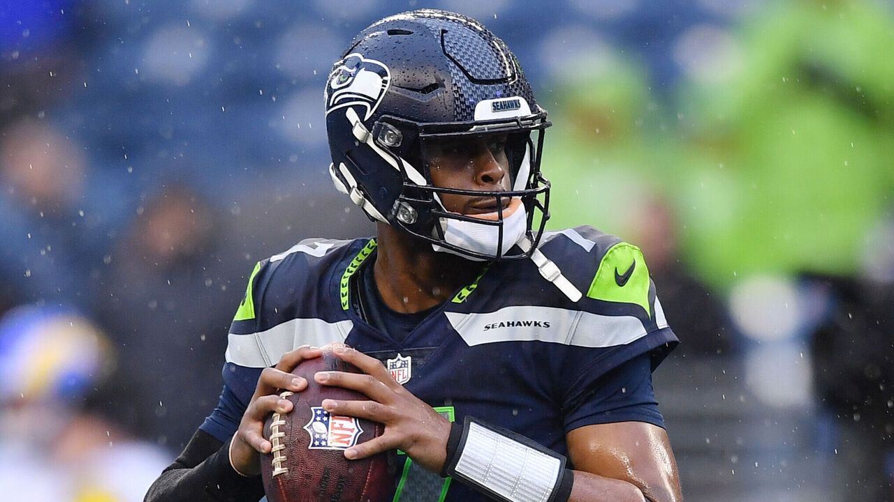 SEATTLE, WASHINGTON - JANUARY 08: Geno Smith #7 of the Seattle Seahawks warms-up prior to the game against the Los Angeles Rams at Lumen Field on January 08, 2023 in Seattle, Washington.