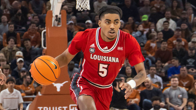 AUSTIN, TX - DECEMBER 21: Louisiana Lafayette Ragin Cajuns guard Jalen Dalcourt (5) comes up court with the ball during the game between Texas Longhorns and Louisiana Lafayette Ragin Cajuns on December 21, 2022, at Moody Center in Austin, TX.