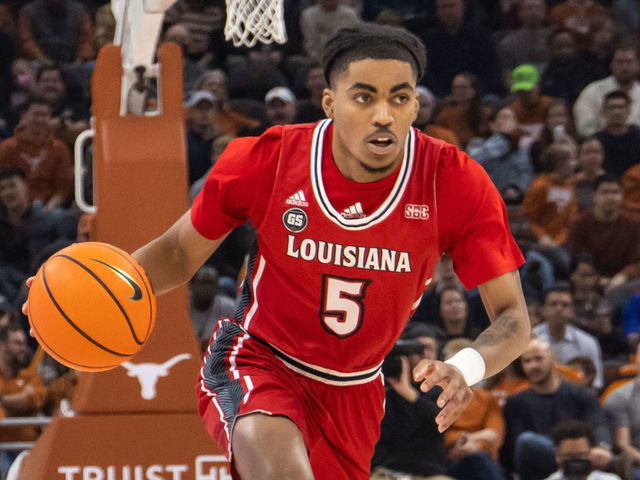 AUSTIN, TX - DECEMBER 21: Louisiana Lafayette Ragin Cajuns guard Jalen Dalcourt (5) comes up court with the ball during the game between Texas Longhorns and Louisiana Lafayette Ragin Cajuns on December 21, 2022, at Moody Center in Austin, TX.